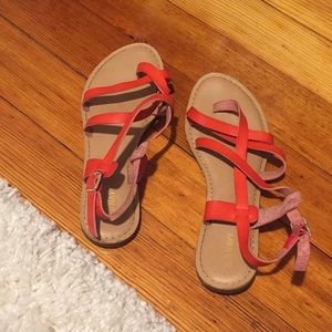 Orange/red scrappy sandals.